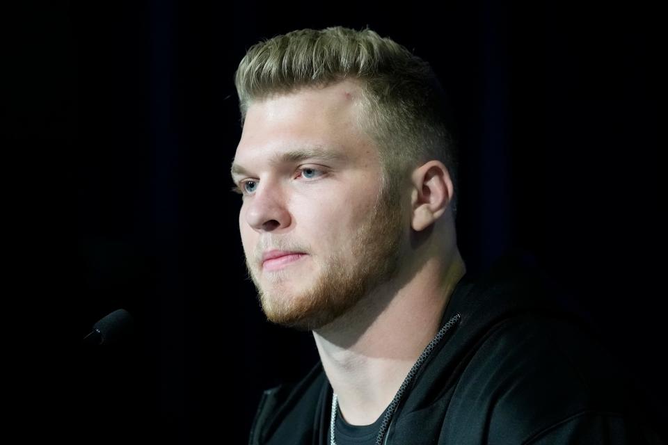 Michigan defensive lineman Aidan Hutchinson speaks during a news conference at the NFL combine in Indianapolis on Friday, March 4, 2022.