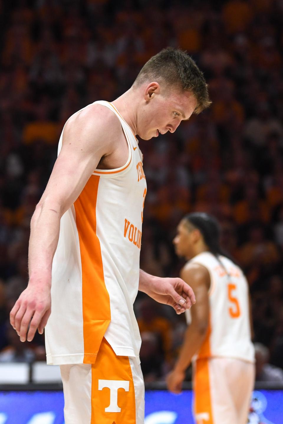 Tennessee guard Dalton Knecht walks across the court with his head down after missing a basket Saturday against Kentucky.