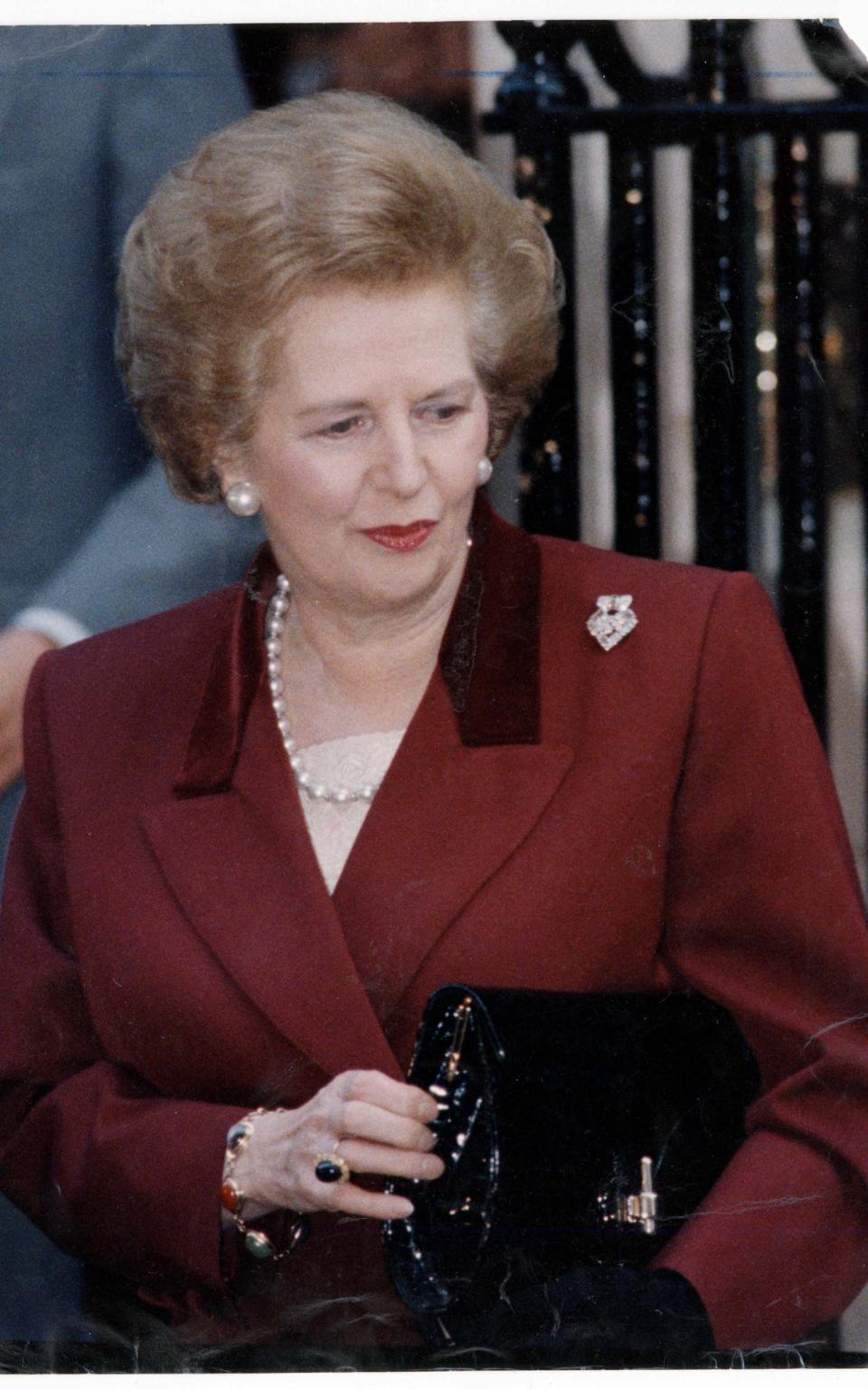 Margaret Thatcher wearing Cartier's arrow brooch on the day she resigned as PM - Rex