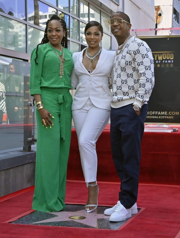 Ashanti (C) is joined by Tichina Arnold (L) and Ja Rule (R) during an unveiling ceremony honoring her with the 2,718th star on the Hollywood Walk of Fame on April 7, 2022 in Los Angeles. Arnold turns 55 on June 28. File Photo by Jim Ruymen/UPI