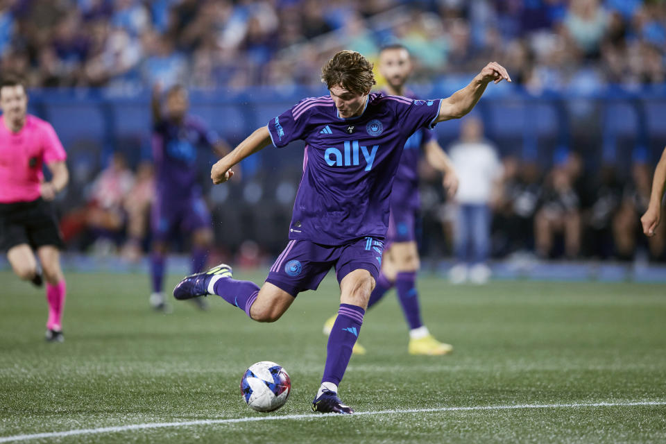 Charlotte FC midfielder Benjamin Bender (15) takes a shot on goal during an MLS soccer match against the Seattle Sounders, Saturday, June 10, 2023, in Charlotte, N.C. (AP Photo/Brian Westerholt)