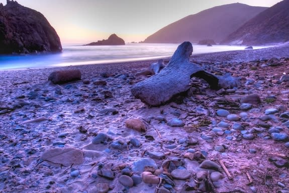 This beautiful photo of Pfeiffer Beach in Big Sur, Calif., was taken on June 12, 2010. The sand gets its <a href="http://www.lifeslittlemysteries.com/purple-royal-color-1750/" rel="nofollow noopener" target="_blank" data-ylk="slk:plum color;elm:context_link;itc:0;sec:content-canvas" class="link ">plum color</a> from manganese garnet particles that wash down from t