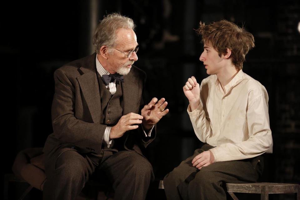 This theater image released by The Public Theater shows Ron Rifkin, left, and Noah Robbins in "The Twenty-Seventh Man," running at The Public Theater at Astor place in New York through Dec. 9. (AP Photo/The Public Theater, Joan Marcus)