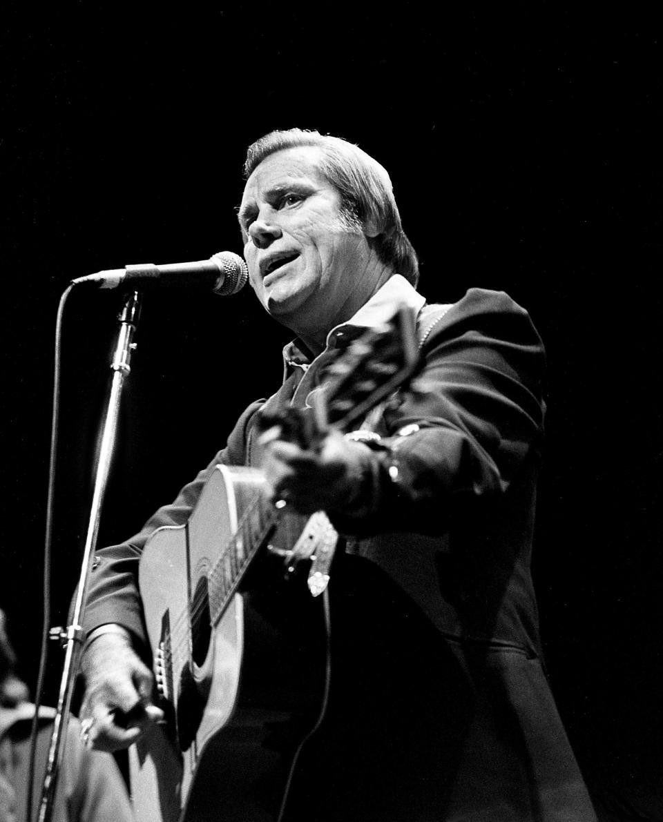 George Jones performs at a Janie Fricke benefit concert for T.J. Martel Foundation for Leukemia and Cancer Research in 1985.