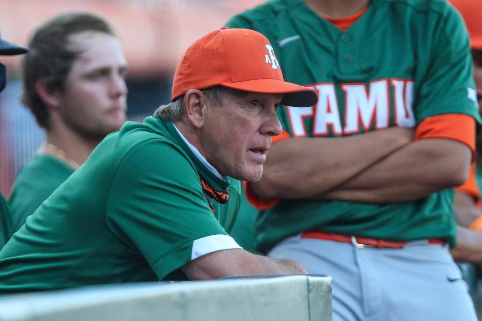 Florida A&M head coach Jamey Shouppe watches the team's NCAA college baseball game against Florida on Wednesday, April 7, 2021, in Gainesville, Fla. (AP Photo/Gary McCullough)