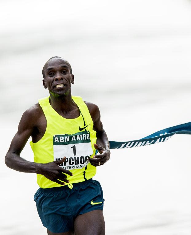 Kenya's Eliud Kipchoge crosses the finish line to win the Rotterdam Marathon, in the Netherlands, in April 2014
