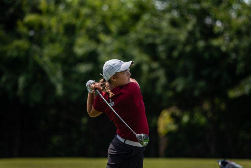 Former BNL girls golf star Olivia Sanders blasts out of the fairway for IU East this season.