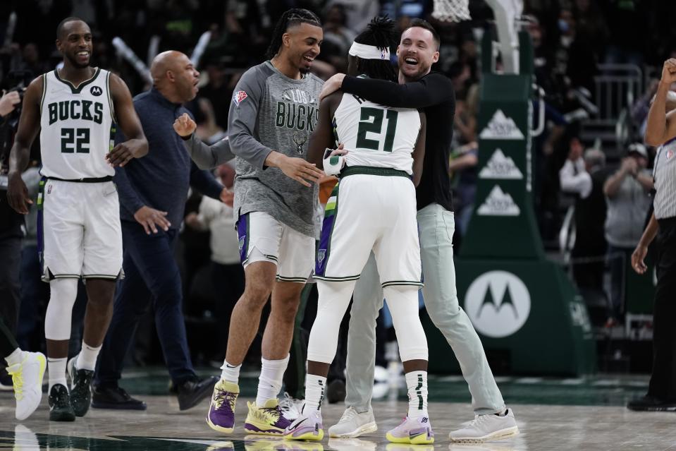 Milwaukee Bucks' Jrue Holiday celebrates after the second half of an NBA basketball game against the Miami Heat Wednesday, March 2, 2022, in Milwaukee. The Bucks won 120-119. (AP Photo/Morry Gash)