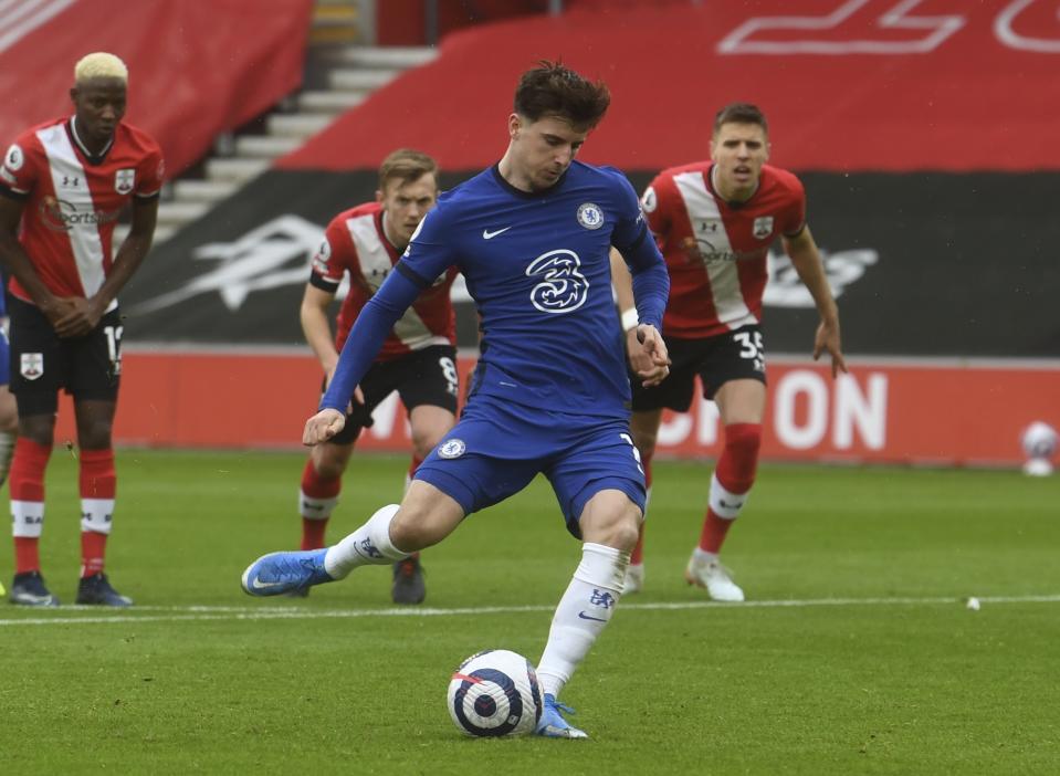 Chelsea's Mason Mount scores on a penalty kick during the English Premier League soccer match between Chelsea and Southampton at St. Mary's Stadium in Southampton, England, Saturday, Feb.20, 2021. (Neil Hall/Pool via AP)