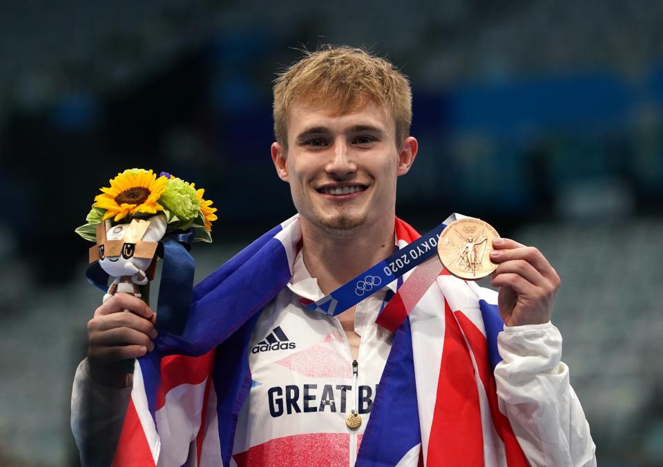 Great Britain’s Jack Laugher celebrates on the podium (Martin Rickett/PA) (PA Wire)