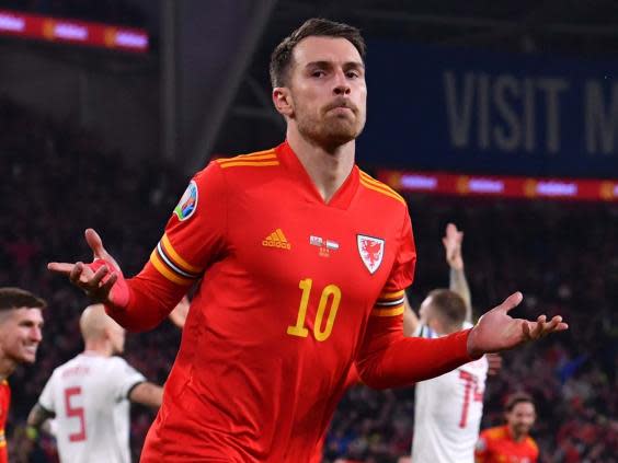 Aaron Ramsey celebrates scoring for Wales (Getty)