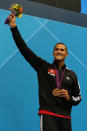 LONDON, ENGLAND - AUGUST 04: Bronze medallist Oussama Mellouli of Tunisia poses on the podium during the medal ceremony for the Men's 1500m Freestyle Final on Day 8 of the London 2012 Olympic Games at the Aquatics Centre on August 4, 2012 in London, England. (Photo by Clive Rose/Getty Images)