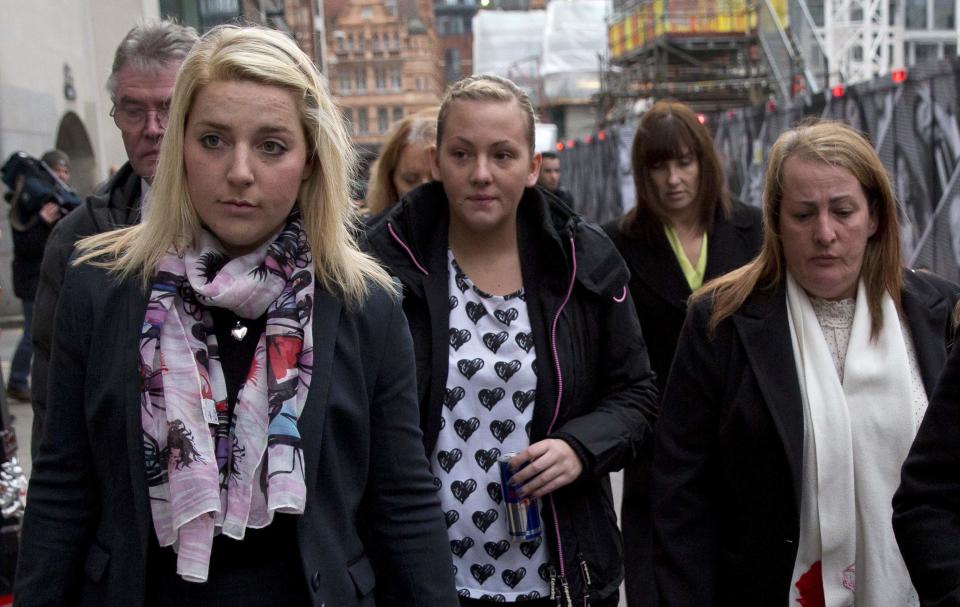 The family of murdered soldier Lee Rigby arrive at the Old Bailey in London, November 29, 2013. The trial of two men accused of murdering Rigby on a south London street earlier this year begins today. REUTERS/Neil Hall (BRITAIN - Tags: CRIME LAW POLITICS MILITARY)