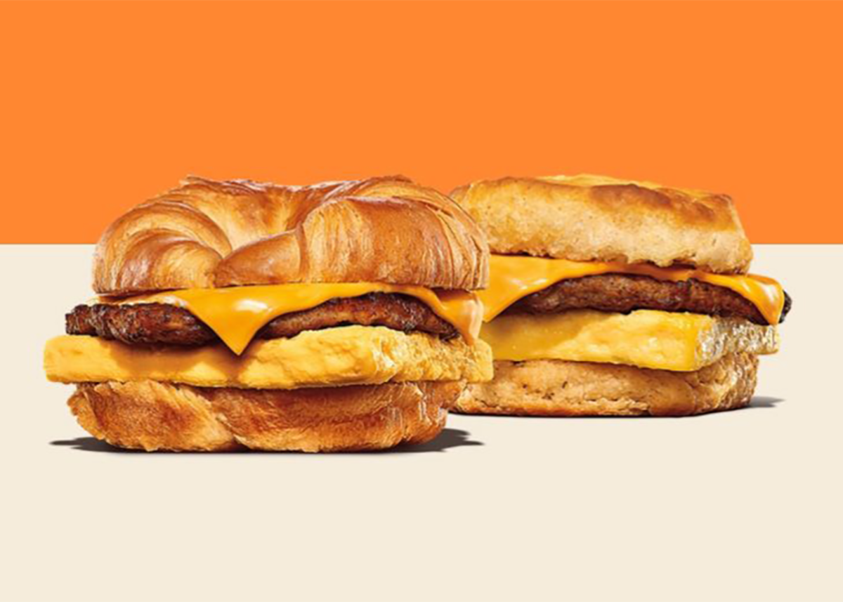 Burger King Croissan'wich Meal for Two, against a half beige and orange background