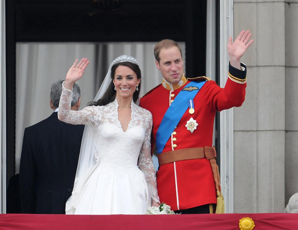 Catherine, Duchess of Cambridge and Prince William, Duke of Cambridge greet well-wishers from the balcony at Buckingham Palace on April 29, 2011 in London, England