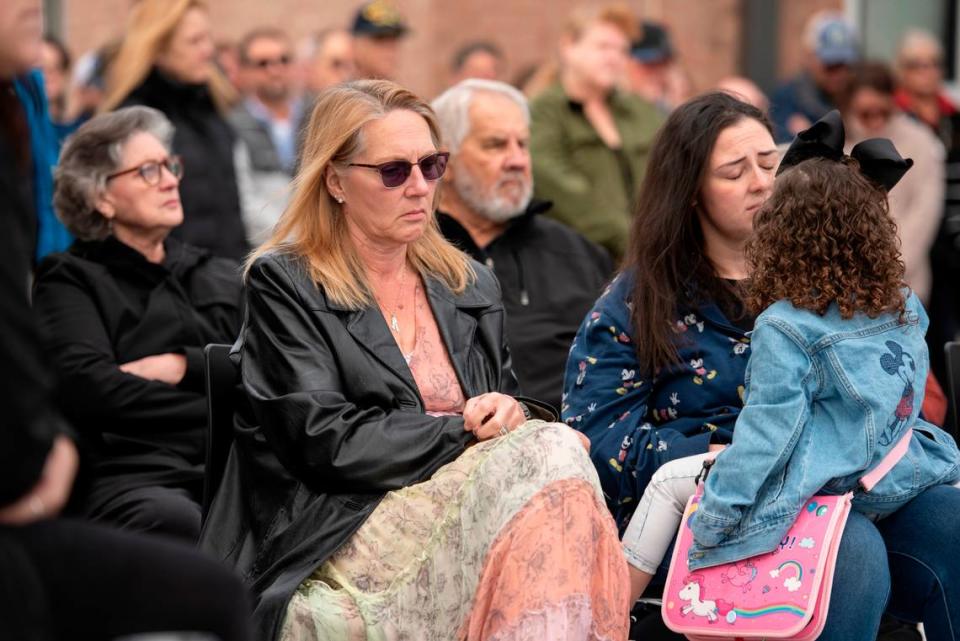 Members of Steven Robin’s family during a ceremony dedicating commemorative stars in honor of Sergeant Steven Robin and Officer Branden Estorffe outside the new Bay St. Louis Police Department in Bay St. Louis on Thursday, Dec. 14, 2023.