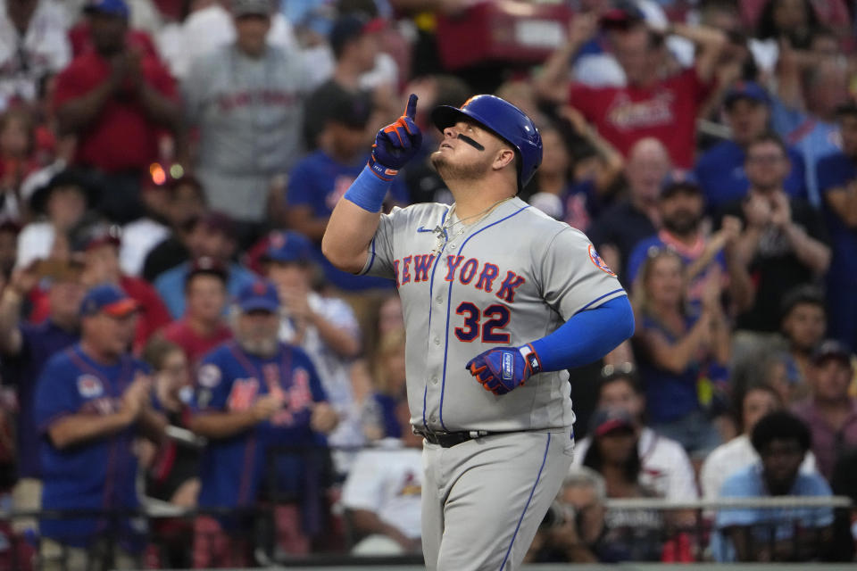 New York Mets' Daniel Vogelbach arrives home after hitting a grand slam during the fifth inning of a baseball game against the St. Louis Cardinals Saturday, Aug. 19, 2023, in St. Louis. (AP Photo/Jeff Roberson)