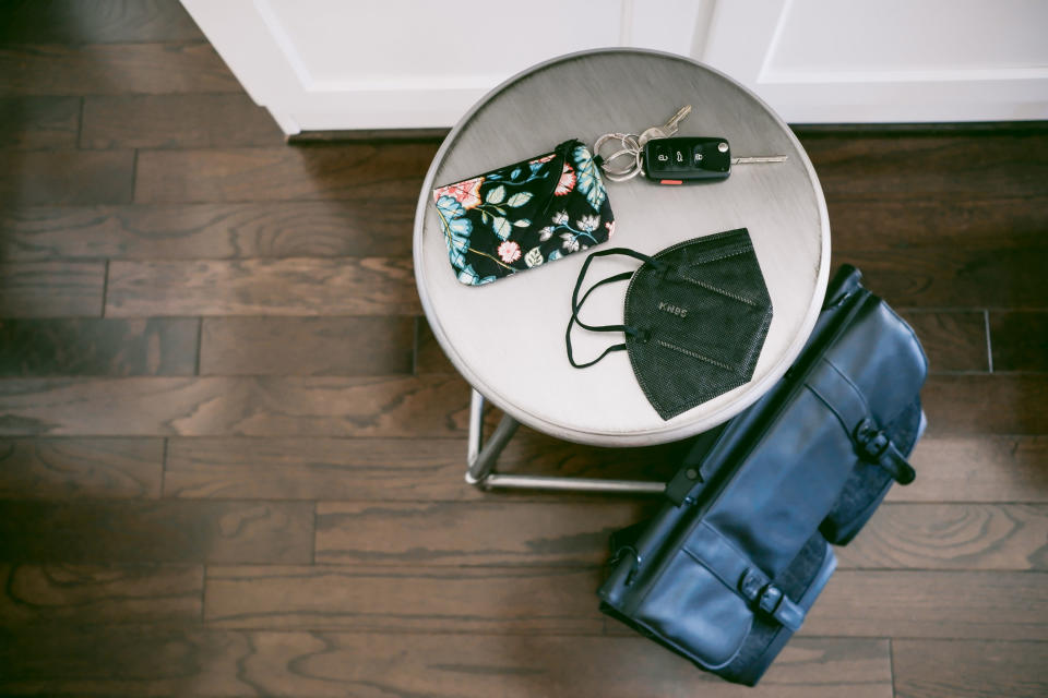 A tray of essentials next to a front door