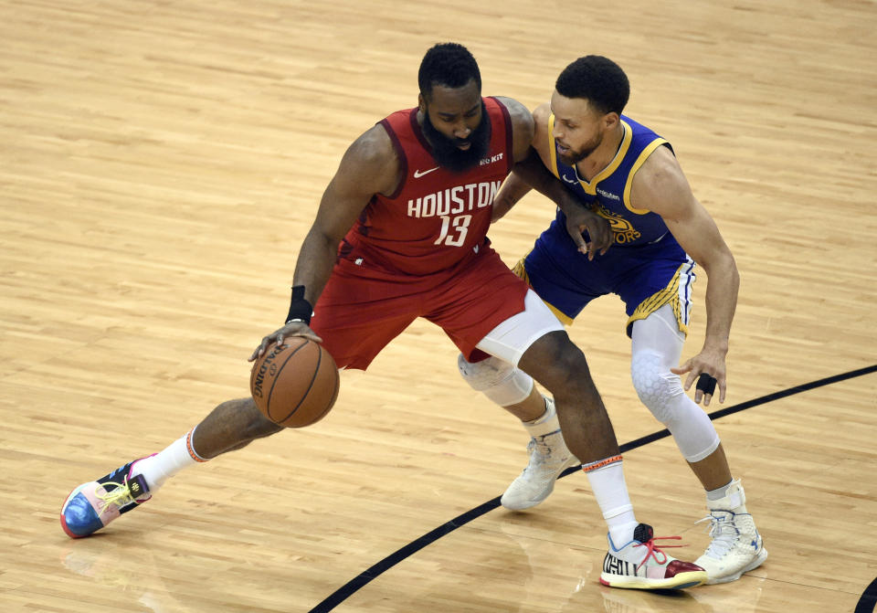 Houston Rockets' James Harden (13) works against Golden State Warriors' Stephen Curry during the second half of Game 6 of a second-round NBA basketball playoff series, Friday, May 10, 2019, in Houston. (AP Photo/Eric Christian Smith)