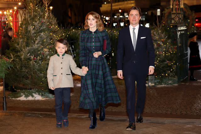 <p>Chris Jackson/Getty Images</p> Christopher Woolf, Princess Beatrice and Edoardo Mapelli Mozzi arrive for the Together At Christmas Carol Service at Westminster Abbey in London on December 8.