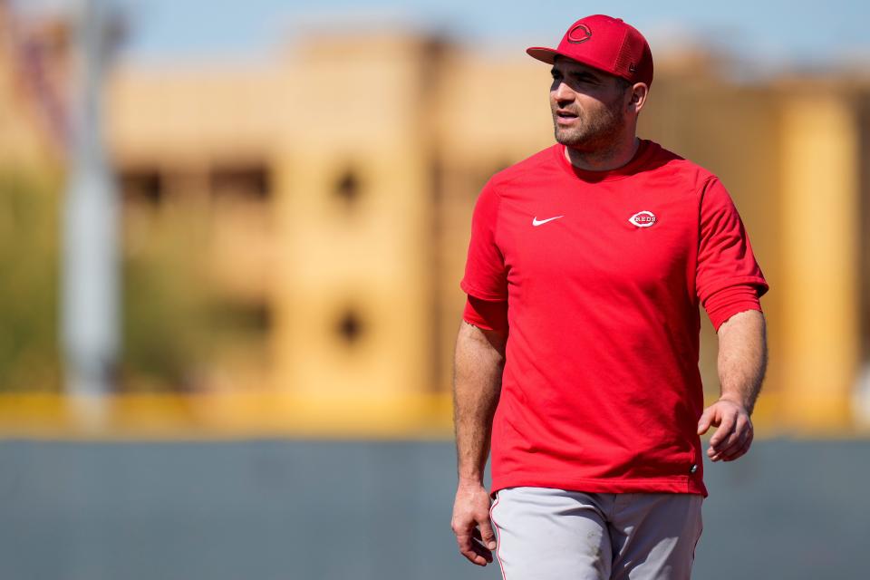 Cincinnati Reds first baseman Joey Votto (19) walks back to first base during a base running drill at the Cincinnati Reds Player Development Complex in Goodyear, Ariz., on Monday, Feb. 20, 2023.