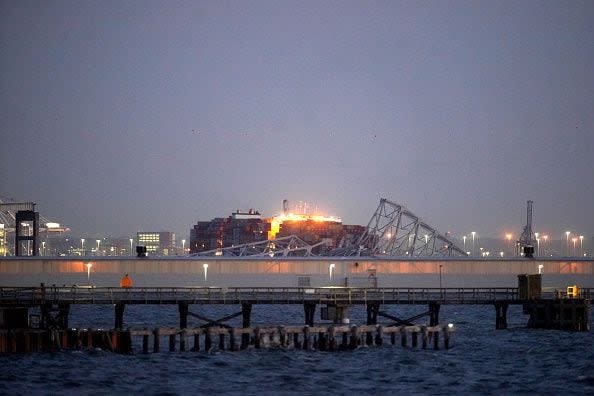 The Dali container vessel after striking the Francis Scott Key Bridge that collapsed into the Patapsco River in Baltimore, Maryland, US, on Tuesday, March 26, 2024. The commuter bridge collapsed after being rammed by the Dali ship, causing vehicles to plunge into the water. Photographer: Al Drago/Bloomberg via Getty Images