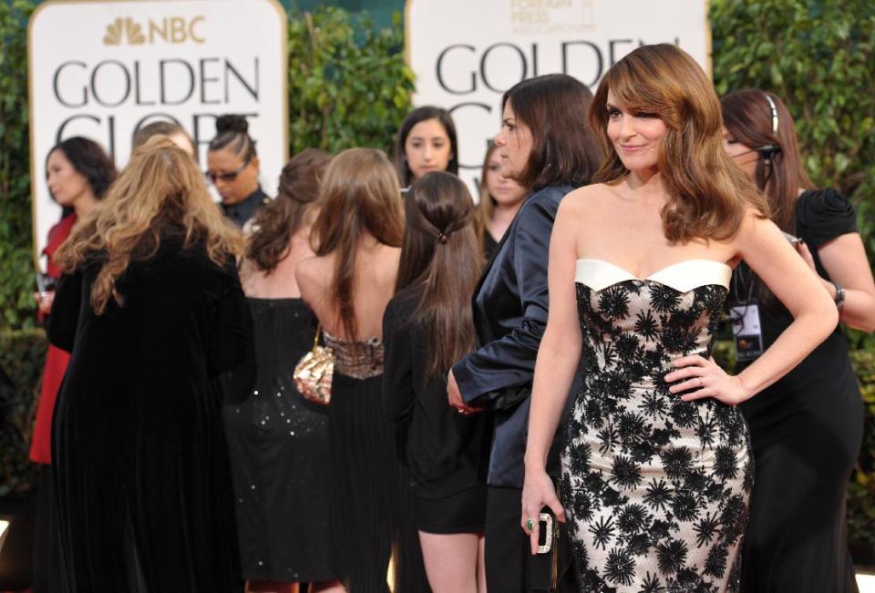 Actress Tina Fey arrives at the 70th Annual Golden Globe Awards at the Beverly Hilton Hotel on Sunday Jan. 13, 2013, in Beverly Hills, Calif. (Photo by John Shearer/Invision/AP)