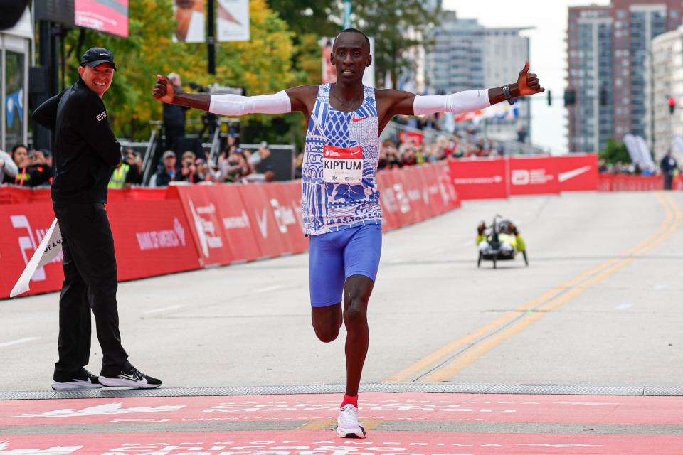 Kenya's Kelvin Kiptum celebrates winning the 2023 Bank of America Chicago Marathon in Chicago, Illinois, in a world record time of two hours and 35 seconds on October 8, 2023.