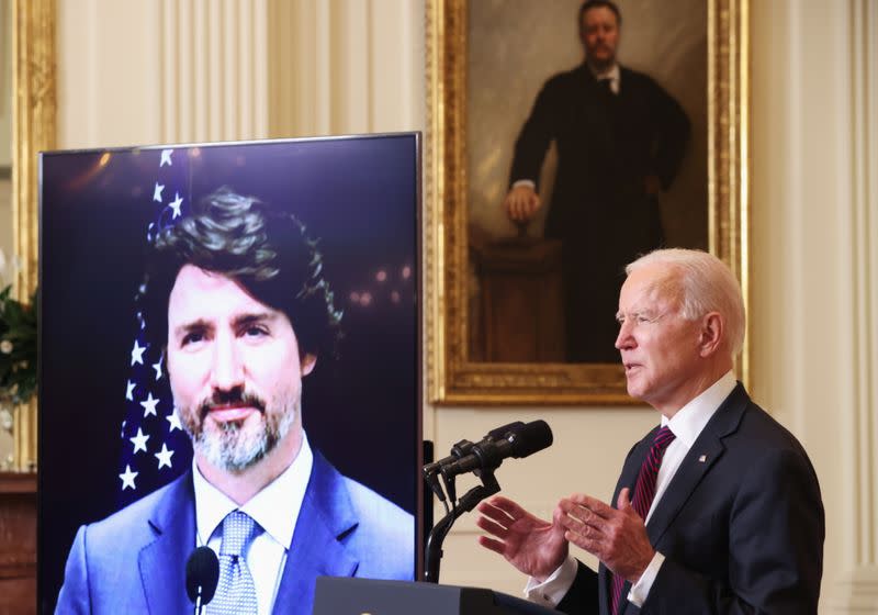 U.S. President Joe Biden and Canada’s Prime Minister Justin Trudeau, appearing via video conference call, give closing remarks at the end of their virtual bilateral meeting from the White House in Washington