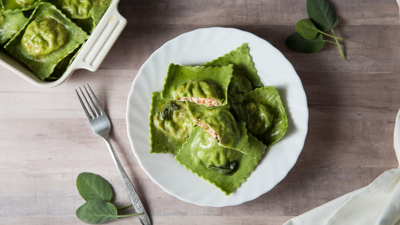 green ravioli on white plate