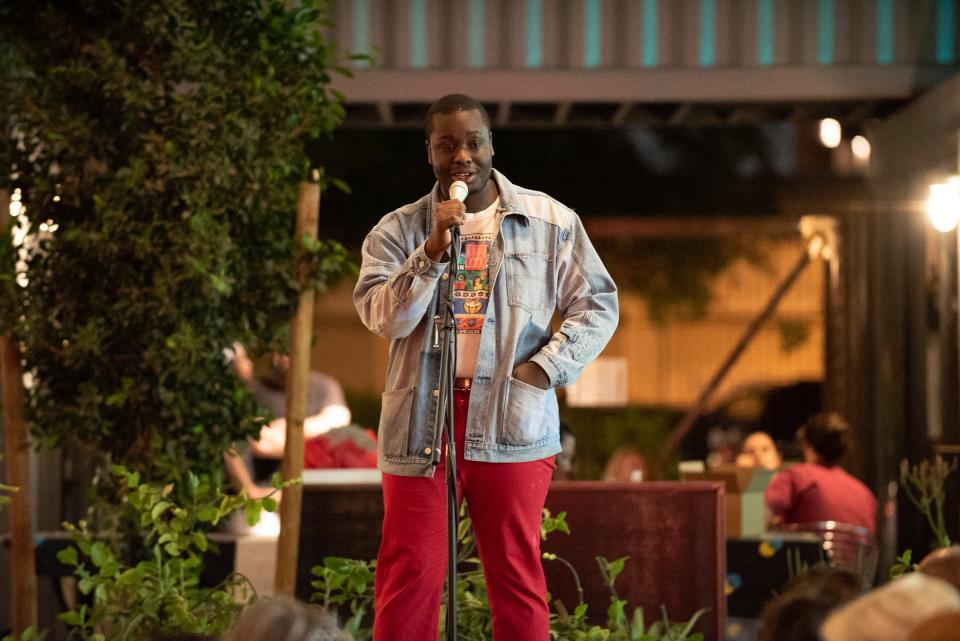 Storyteller Jordan Pollins tells his tale during the Arizona Storytellers Project Growing Up show at The Churchill in Phoenix on Tuesday, April 9, 2019.