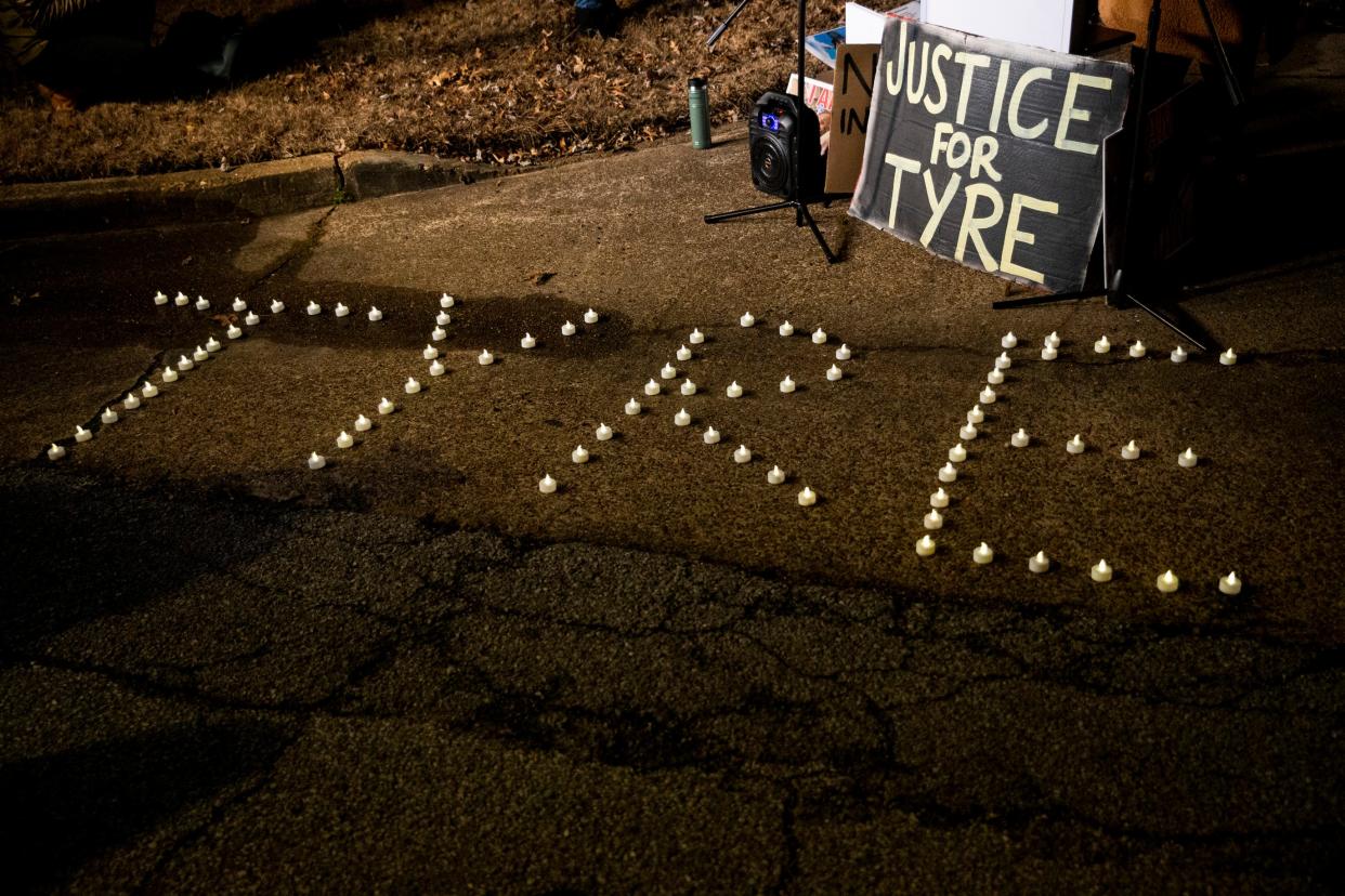 Candles spelling out “Tyre” can be seen during a candlelight vigil for Nichols held at the site where he was beaten to death by Memphis Police Department officers on the one year anniversary of his death in Memphis, Tenn., on Sunday, January 7, 2024.