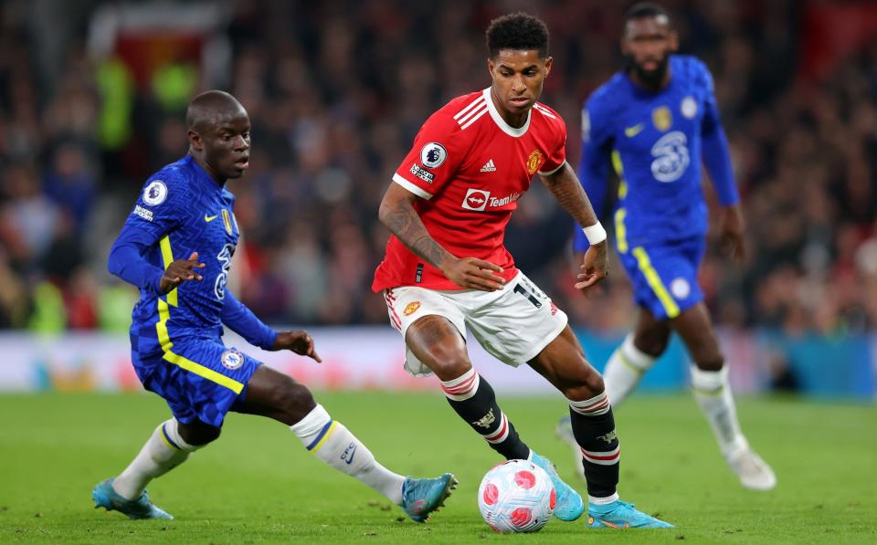 Marcus Rashford of Manchester United is challenged by Ngolo Kante of Chelsea during the Premier League match between Manchester United and Chelsea at Old Trafford on April 28, 2022 in Manchester - GETTY IMAGES