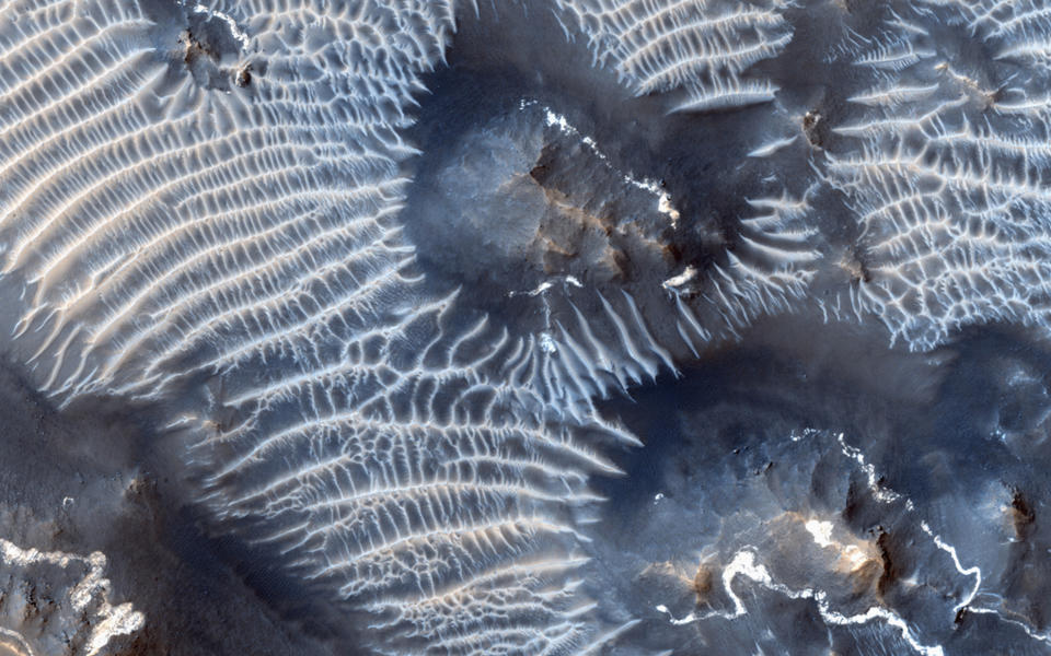 <p>A view of the Noctis Labyrinthus region of Mars, perched high on the Tharsis rise in the upper reaches of the Valles Marineris canyon system, is seen in this NASA handout picture acquired on Aug. 31, 2013, by the HiRISE (High Resolution Imaging Science Experiment) instrument aboard NASA’s Mars Reconnaissance Orbiter (MRO). (Photo: NASA/JPL-Caltech/Univ. of Arizona/Reuters) </p>