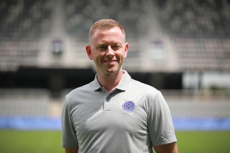 Former Racing Louisville FC coach Christy Holly poses for a picture at Lynn Family Stadium in Louisville, Ky. Holly was fired "for cause" in August 2021.