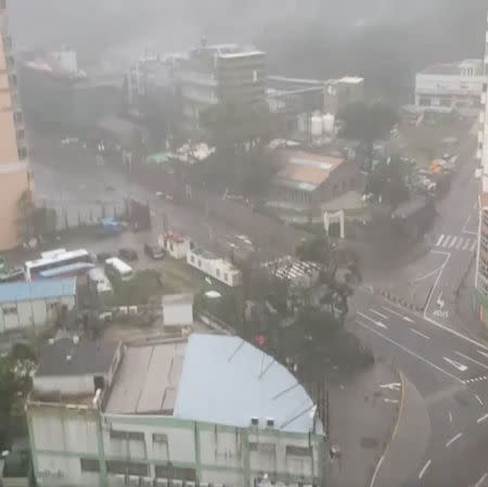 A storm batters a street in Macau during Typhoon Hato, in this still image taken from social media video obtained by Reuters August 24, 2017. Deo Carmel Viste/via REUTERS