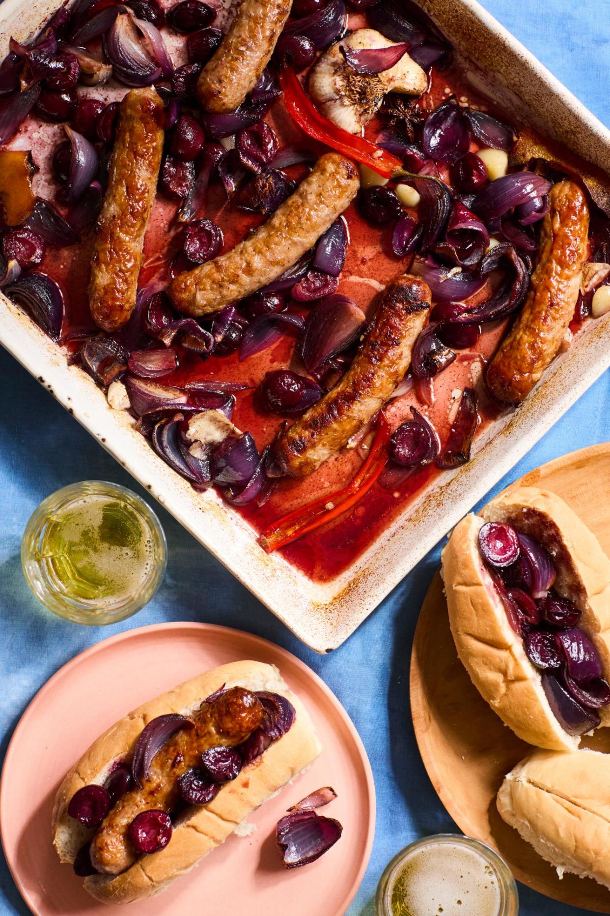 <span>Ravinder Bhogal’s sticky five-spice sausages with cherries. </span><span>Photograph: Ola O Smit/The Guardian. Food and props stylist: Kitty Coles. Food and props styliing assistant: Grace Jenkins</span>