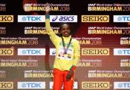 Athletics - IAAF World Indoor Championships 2018 - Arena Birmingham, Birmingham, Britain - March 3, 2018 Gold medalist Ethiopia's Genzebe Dibaba during the medals ceremony for the Women's 1500m Action Images via Reuters/John Sibley