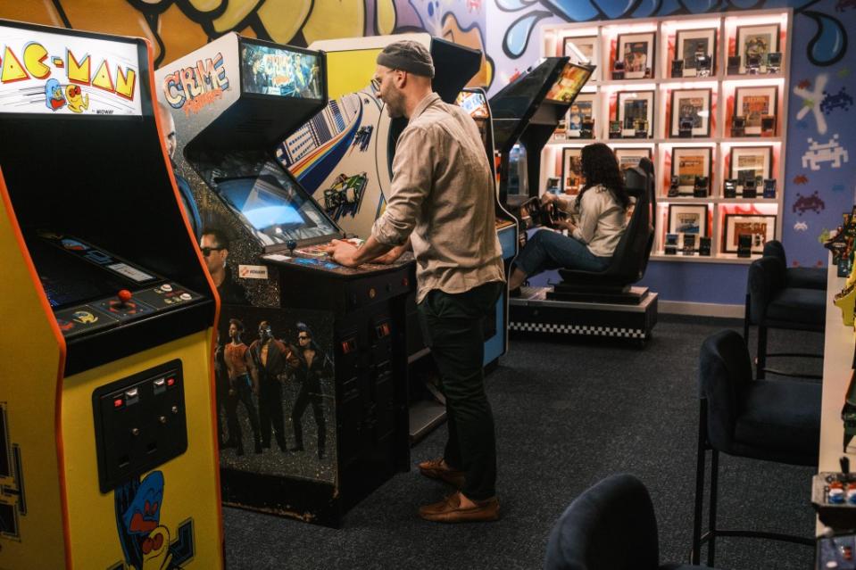 A “time capsule” floor at 120 Broadway boasts a 1980s-style video game arcade. Stephen Yang