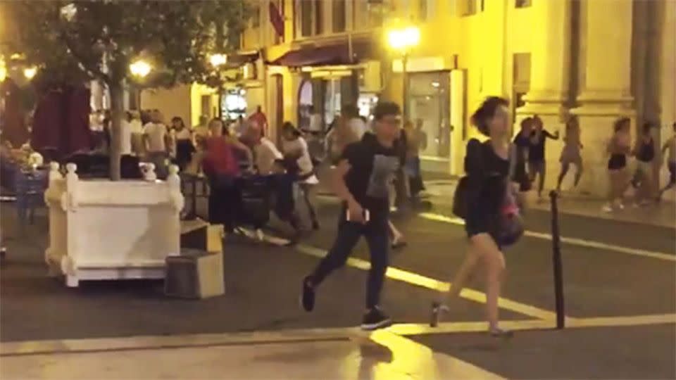 People running through the streets of France in fear. Photo: Twitter