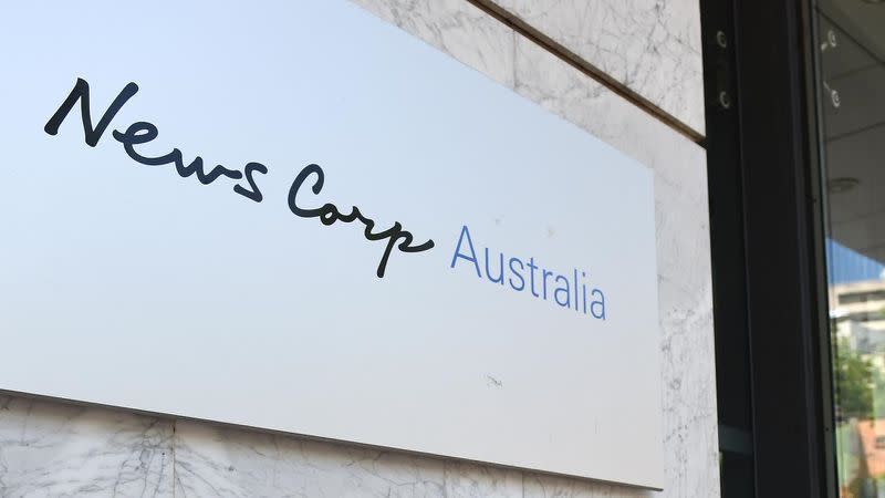 Images of News Corp logo as company ceases printing 100 papers, 500 jobs lost