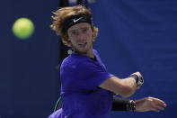 Andrey Rublev, of Russia, returns during a match against Maxime Cressy, of the United States, at the Citi Open tennis tournament in Washington, Friday, Aug. 5, 2022. (AP Photo/Carolyn Kaster)