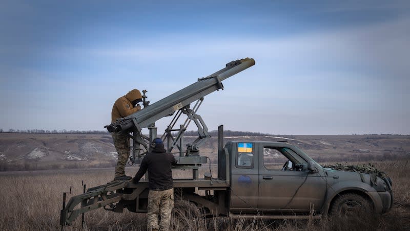 Ukrainian soldiers from The 56th Separate Motorized Infantry Mariupol Brigade prepare to fire a multiple launch rocket system based on a pickup truck towards Russian positions at the front line, near Bakhmut, Donetsk region, Ukraine, March 5, 2024.