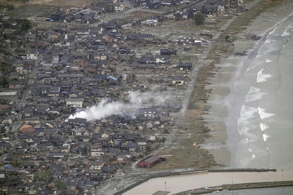 This aerial photo shows an area affected by an earthquake in Suzu, Ishikawa prefecture, Japan Tuesday, Jan. 2, 2024. (Kyodo News via AP)