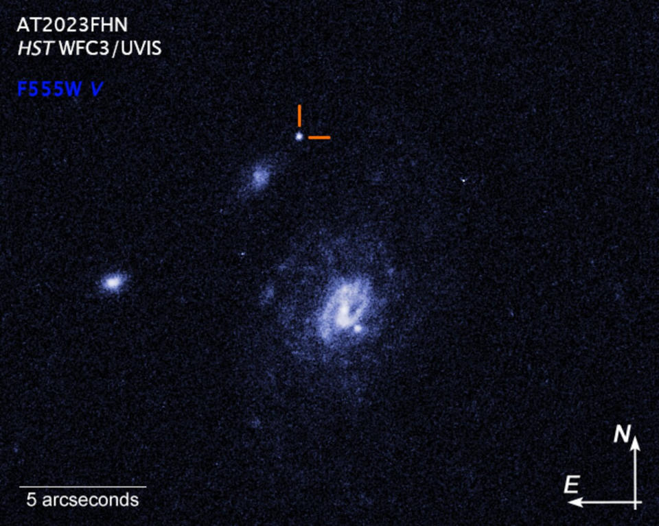 The Hubble Space Telescope's image of the Finch and its location near two galaxies.