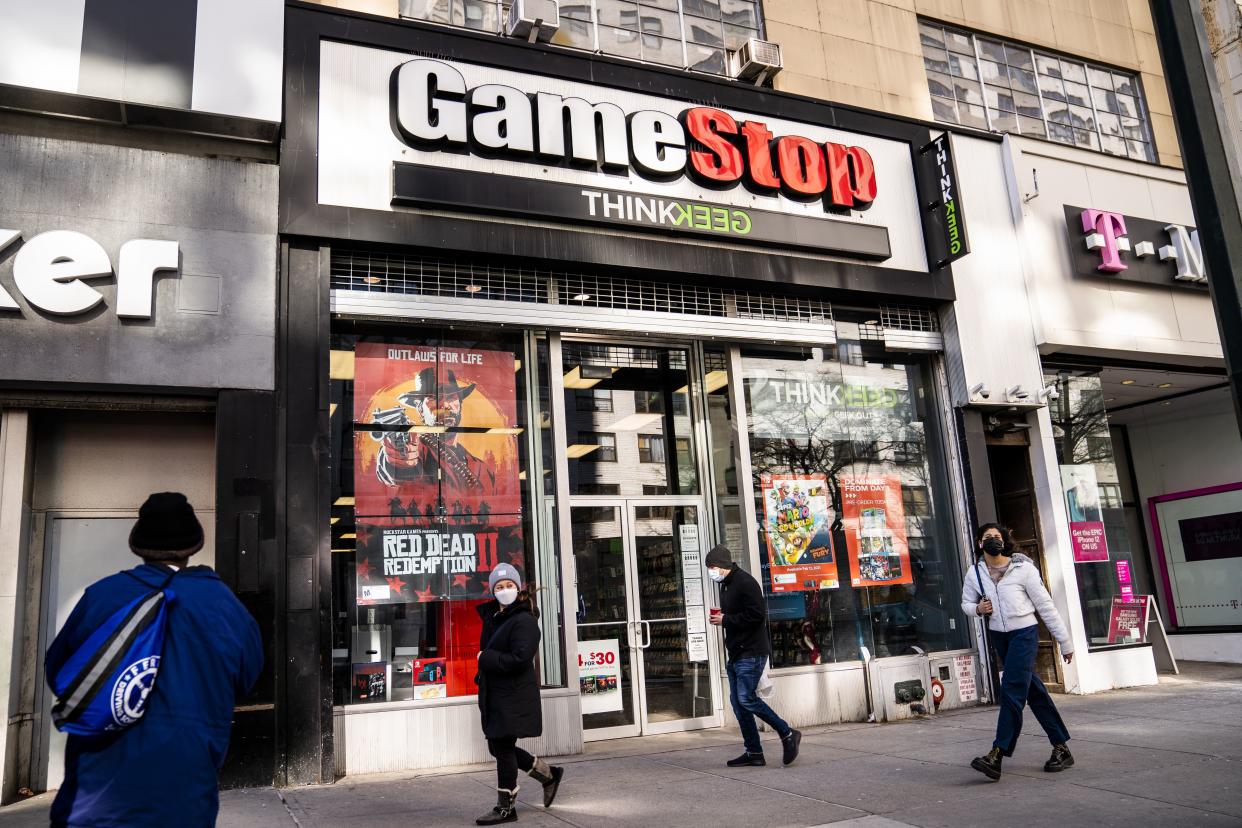 Pedestrians pass a GameStop store on 14th Street at Union Square, Thursday, Jan. 28, in the Manhattan borough of New York. 