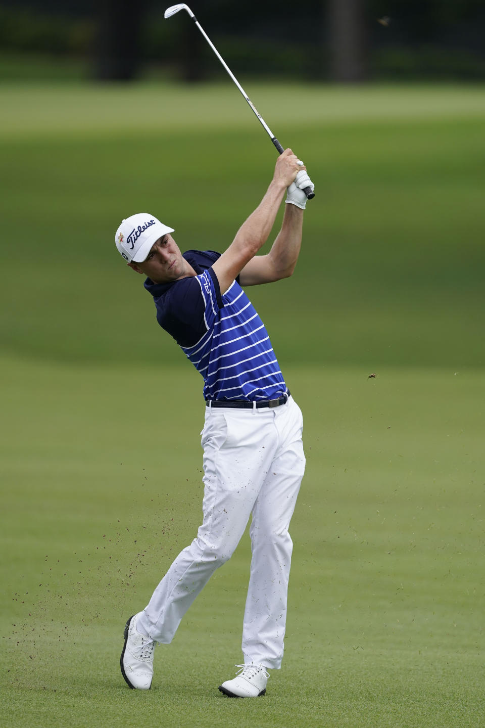 Justin Thomas hits from the third fairway during the first round of the Tour Championship golf tournament at East Lake Golf Club in Atlanta, Friday, Sept. 4, 2020. (AP Photo/John Bazemore)