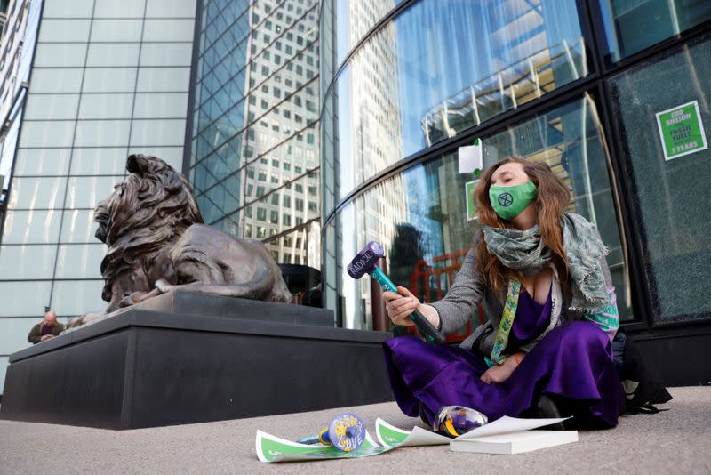 Extinction Rebellion activists protest at Canary Wharf in London