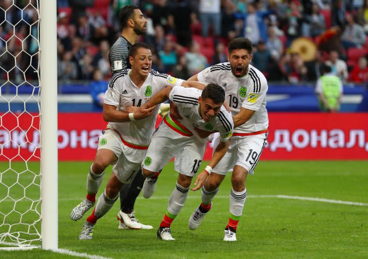 Mexico escaped with a point against Portugal thanks to Hector Moreno (center) and his stoppage-time header. (Getty)