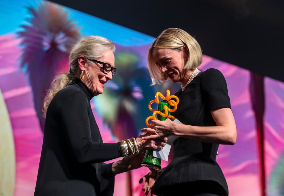 Meryl Streep presents the International Star Award to Carey Mulligan for her work in "Maestro" during the Palm Springs International Film Awards in Palm Springs, Calif., Thursday, Jan. 4, 2024.